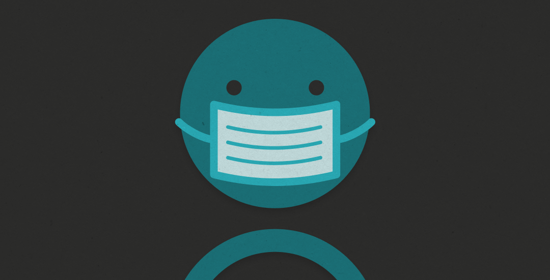 Image of a smiley face wearing a light blue mask against a dark background.